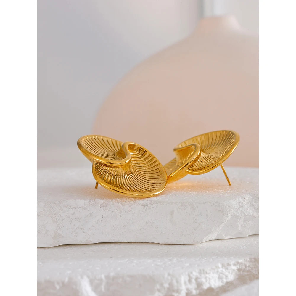 Shell-Inspired Spiral Studs